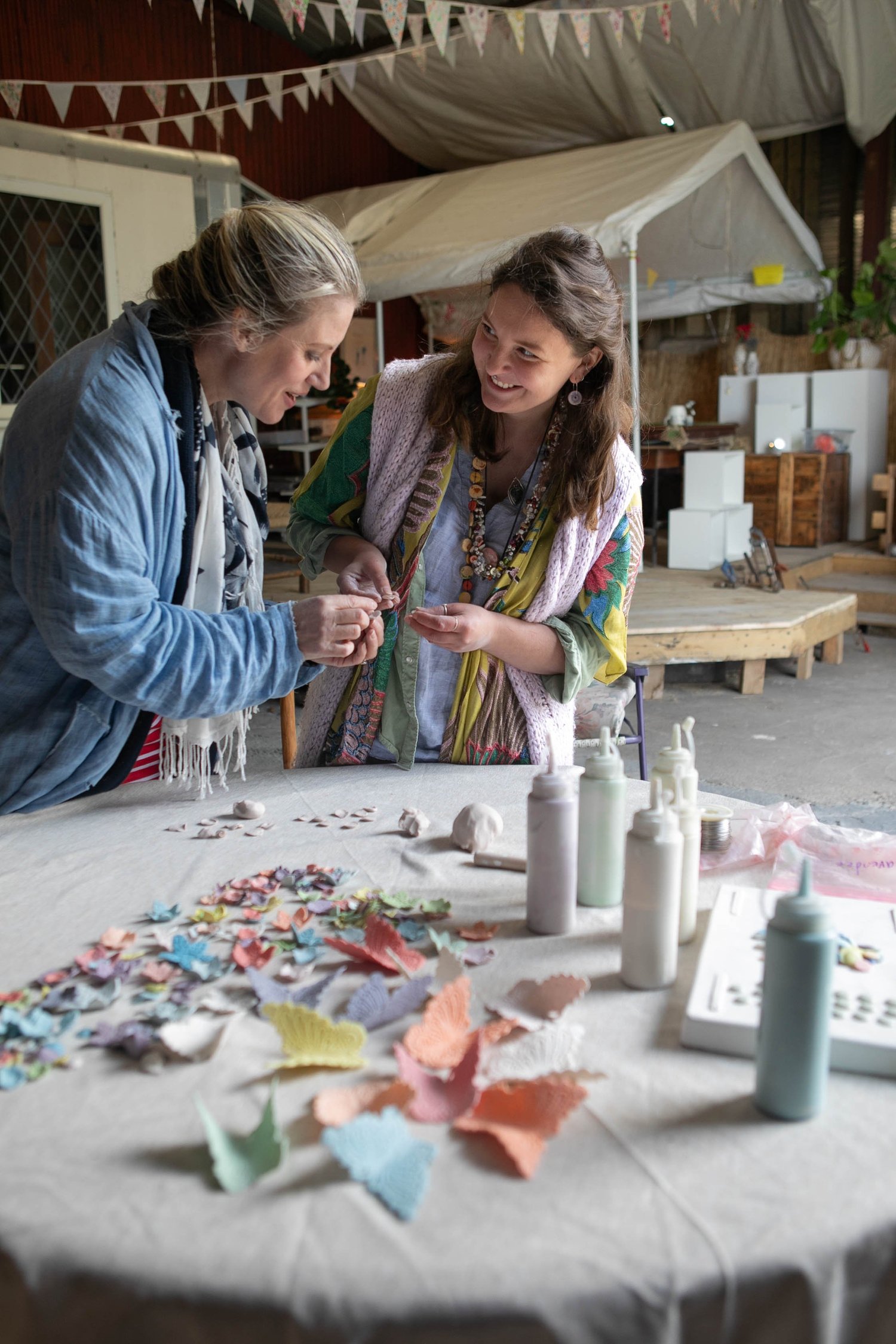 Pip Whiteside shows Lancashire Life columnist Dee Parks how to make mini clay roses