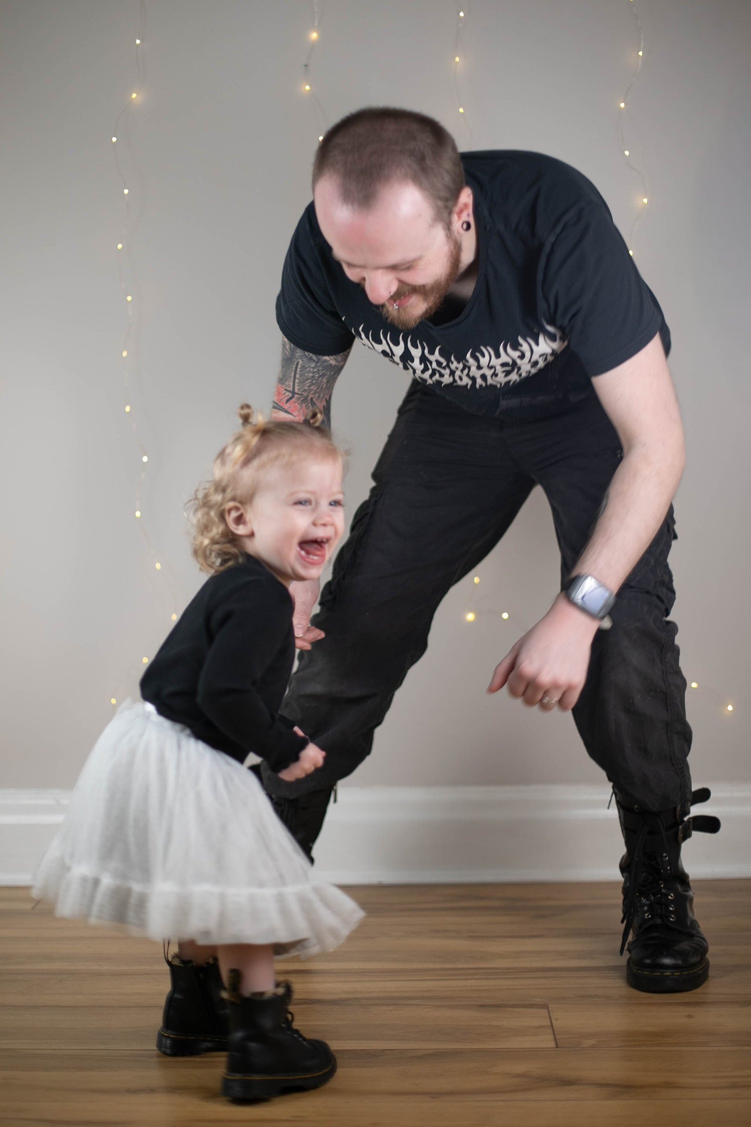 Toddler portrait with fairy lights