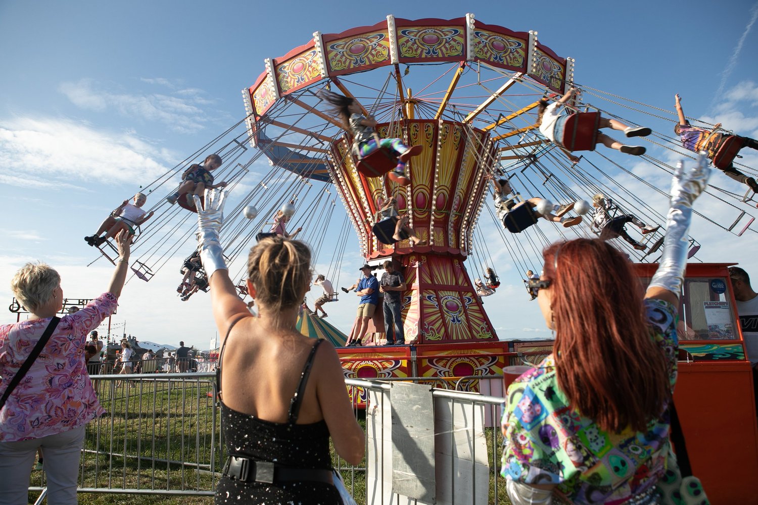 Festival-goer waving at Solfest 2022